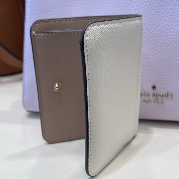 Kate Spade Madison Small Bifold Wallet
Meringue 
NWT - Picture 9 of 16